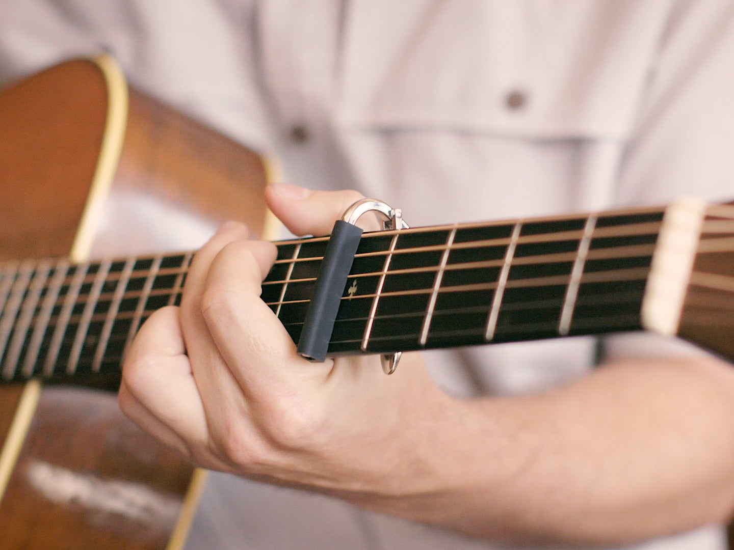 Steel string store capo